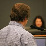 Kirkland National Little League President Jonathan Friebert speaks before the Kirkland City Council on Nov. 15. Friebert was one of several speakers in opposition to proposed rate increases for local ballfield rentals. JOHN WILLIAM HOWARD/Kirkland Reporter