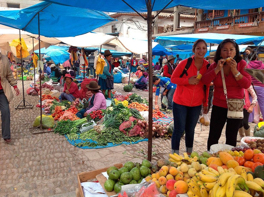 Kirkland resident Matilde Melendez (right) visits a fruit market in Cusco, Peru. She has started her own business, Conquer Peru, in which she coordinates travel plans to the country for customers. Submitted photo