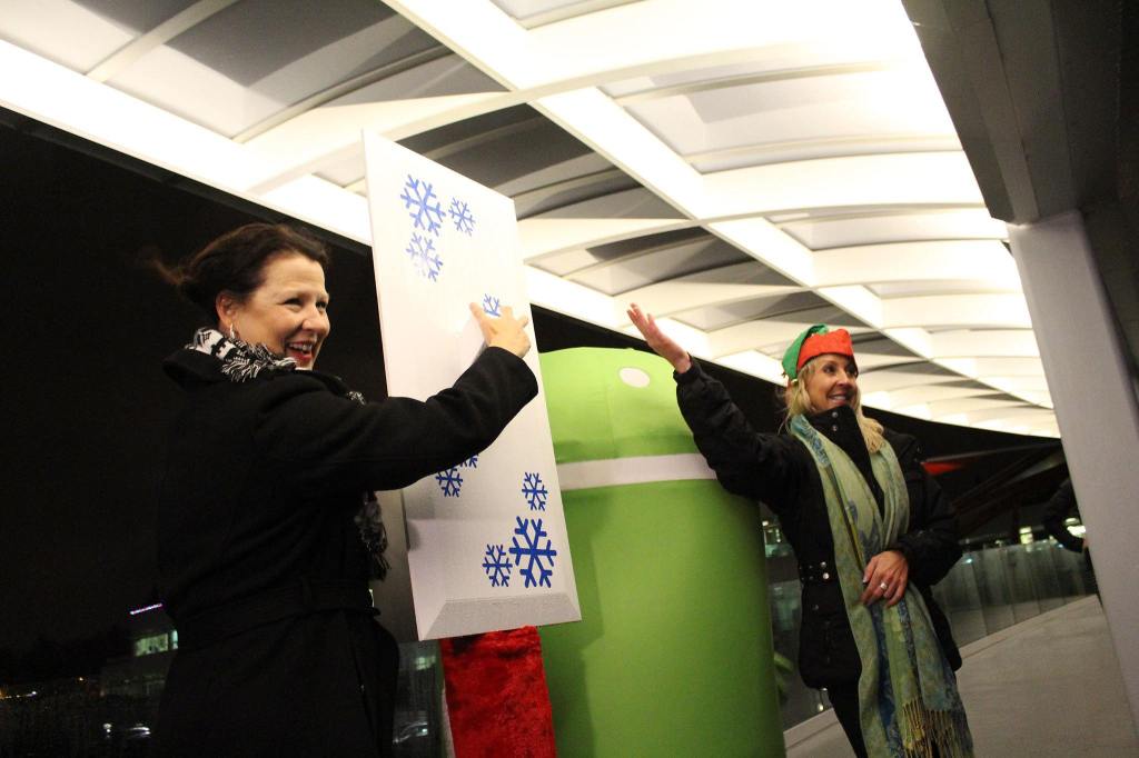 Kirkland Mayor Amy Walen and Downtown Kirkland Association Executive Director Barbie Collins Young turn on the holiday light display on the Cross Kirkland Corridor as part of the Google Lights event on Dec. 2. Contributed photo