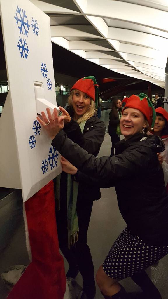 Downtown Kirkland Association Executive Director Barbie Collins Young and Google Head of External Affairs Darcy Nothnagle get ready to turn on the holiday light display on the Cross Kirkland Corridor as part of the Google Lights event on Dec. 2. SAMANTHA ST. JOHN / Contributed photo