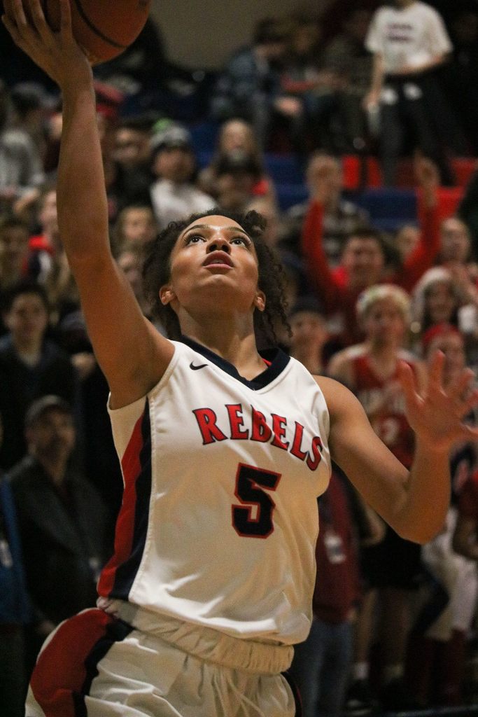 Juanita senior Tea Adams goes in for a layup during the second half of Friday&rsquo;s game against Lake Washington. JOHN WILLIAM HOWARD/Kirkland Reporter