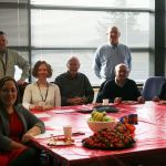 Kirkland City Hall front desk volunteers and staff, along with Volunteer Coordinator Patrick Tefft (standing, second from left), gather for an end-of-year appreciation breakfast. CATHERINE KRUMMEY/Kirkland Reporter