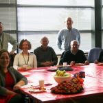 Kirkland City Hall front desk volunteers and staff, along with Volunteer Coordinator Patrick Tefft (standing, second from left), gather for an end-of-year appreciation breakfast. CATHERINE KRUMMEY/Kirkland Reporter