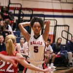 Juanita senior Tea Adams looks for an open teammate during the Rebels&rsquo; win over Mount Si on Dec. 21. Adams led with 18 points, but was active in getting teammates involved in the offense. JOHN WILLIAM HOWARD/Kirkland Reporter
