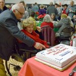 Columbia Athletic Club owners Cy and Feryal Oskoui cut the 35th anniversary cake. Julianna Jade/Contributed photo
