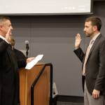 New Kirkland City Councilmember Jon Pascal (right) takes his oath of office from Kirkland Municipal Court Judge Michael Lambo. KATHY CUMMINGS/Contributed photo