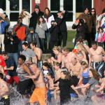 Polar Bear Plunge participants enter Lake Washington at Marina Park in Kirkland. CATHERINE KRUMMEY/Kirkland Reporter