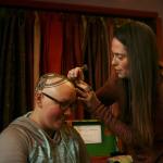 Kirkland artist Sarah Walters creates a henna crown for Mary Glasco at Sankara Imports in Bothell. CATHERINE KRUMMEY/Kirkland Reporter