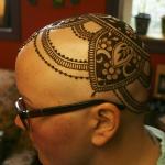 Mary Glasco shows off her henna crown, created by Kirkland artist Sarah Walters at Sankara Imports in Bothell. CATHERINE KRUMMEY / Kirkland Reporter