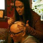 Kirkland artist Sarah Walters creates a henna crown for Mary Glasco at Sankara Imports in Bothell. CATHERINE KRUMMEY/Kirkland Reporter