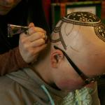 Kirkland artist Sarah Walters creates a henna crown for Mary Glasco at Sankara Imports in Bothell. CATHERINE KRUMMEY/Kirkland Reporter
