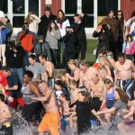 Polar Bear Plunge participants enter Lake Washington at Marina Park in Kirkland. CATHERINE KRUMMEY/Kirkland Reporter