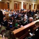 A crowd gathers at the Bastyr University Chapel in Kenmore for a public hearing on the proposed lease of the St. Edward Seminary. CATHERINE KRUMMEY/Kenmore Reporter
