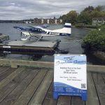 A seaplane sits moored at the guest pier in front of the Woodmark Hotel at Carillon Point. Contributed photo