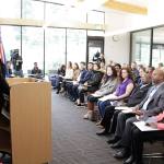 Immigration Services Officer Nicole Al Khafaji speaks to 20 local immigrants before they become U.S. citizens during a naturalization ceremony at the Kingsgate Library. KATHY CUMMINGS / Contributed photo