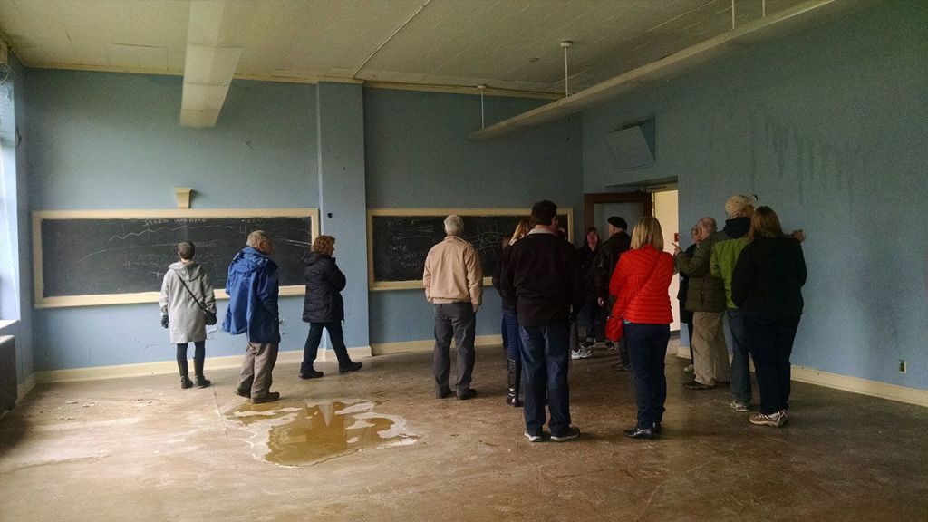 Open house attendees check out a classroom during a tour of the St. Edward Seminary on Feb. 11. CATHERINE KRUMMEY/Kenmore Reporter