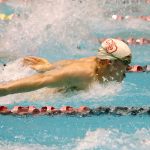 Juanita senior Charlie Kullman competes in the consolation final of the 100 fly. Kullman placed 12th overall in the event with a time of 53.85. Joe Livarchik/Mercer Island Reporter