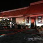 Kirkland Fire Department crews had to break through the gloss front door of the Brown Bag Cafe during a call Saturday night. Contributed photo/City of Kirkland