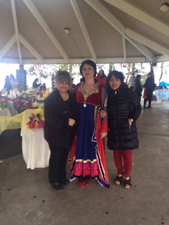 Organizers Zohreh Fard, Nazanin Nabaie and Guita Baldwin pose for a photo at the Nowruz Festival on March 18 at Marina Park in Kirkland. Contributed photo