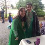 Parisa Baldwin and Ava Afshari pose for a photo at their face-painting station at the Nowruz Festival on March 18 at Marina Park in Kirkland. Contributed photo