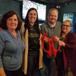 The new owners of the Dub Pub, middle, Lee Dumas and Athina Mangouras, are joined by their mothers during the ribbon cutting to celebrate their acquisition of the bar and grill. Contributed photo