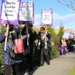 EvergreenHealth employees rally in Kirkland for higher wages, better healthcare