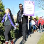 EvergreenHealth employees rally in Kirkland for higher wages, better healthcare