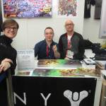 Kirkland resident Noah Ingram (center) poses for a picture with artist Emily Figenschuch and his father, Jody Ingram, on March 4 at Emerald City Comicon. Contributed photo
