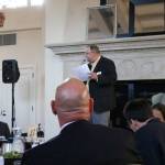 Kenmore Mayor David Baker, who is the current Sound Cities Association (SCA) Board of Directors president, serves as the emcee at a SCA dinner in Kenmore. CATHERINE KRUMMEY / Kenmore Reporter