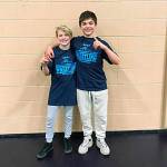 Kirkland Middle School wrestlers Chase Martin, left, and Jackson Lux won titles in their respective weight divisions at the 2017 middle school wrestling district championships, held March 27 and 28 at Kirkland Middle School (photo courtesy of John Lux).