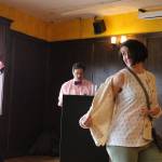 Heather Woods shows off a printed shirt while emcee J.D. Drollinger describes the outfit. CATHERINE KRUMMEY/Kirkland Reporter