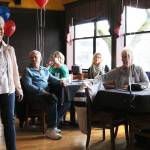 Sheila Dwyer models fashions from Essentials on Park Lane during an American Cancer Society event at Wilde Rover. CATHERINE KRUMMEY / Kirkland Reporter
