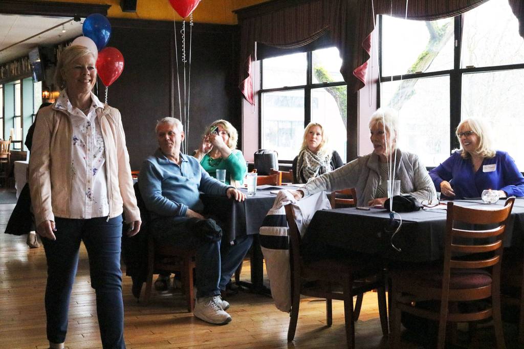 Sheila Dwyer models fashions from Essentials on Park Lane during an American Cancer Society event at Wilde Rover. CATHERINE KRUMMEY / Kirkland Reporter