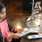 Ira Ganjikunta, 6, talks about the different colors of paint she uses. CATHERINE KRUMMEY / Kirkland Reporter