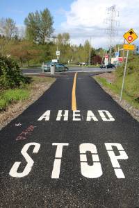 The Cross Kirkland Corridor is broken up by two streets and one of the biggest intersections in the city in the Totem Lake neighborhood. MATT PHELPS/Kirkland Reporter                                 Above are the four options for the Totem Lake Connector Bridge, including, from top, &ldquo;The Gates&rdquo;, &ldquo;Half Arches&rdquo;, &ldquo;Skipping Stone&rdquo;, and &ldquo;Suspended Ring&rdquo;. Artist&rsquo;s renderings/City of Kirkland