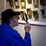 Parklane Gallery provides magnifying glasses for those who want to closely inspect the miniature art. Contributed photo