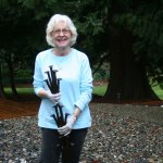 Merrily Dicks holds a sample of &ldquo;The Spikes&rdquo; sculpture that is displayed in her Kirkland backyard. One of her assistants, Yancy McCoy, helped create this piece. The full sculpture has been installed on the Cross Kirkland Corridor. CATHERINE KRUMMEY / Kirkland Reporter
