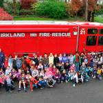 Ben Franklin Elementary School second graders visit Fire Station 22 in the Central Houghton Neighborhood. Contributed photo