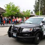 Ben Franklin Elementary School second graders learn about being a Kirkland police officer outside of Kirkland City Hall. Contributed photo