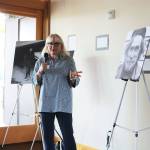 Rep. Joan McBride speaks at an Affordable Housing Week event at Velocity Apartments in Kirkland. CATHERINE KRUMMEY / Kirkland Reporter
