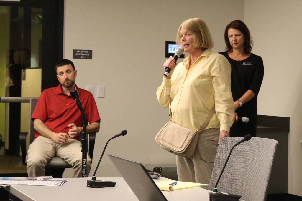 Kirkland City Councilmember Penny Sweet (center) answers an audience question at Kirkland City Hall as Councilmember Jon Pascal and Mayor Amy Walen observe. CATHERINE KRUMMEY / Kirkland Reporter