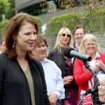 Kirkland Mayor Amy Walen speaks at a ribbon-cutting ceremony for the new parking lot in downtown Kirkland. The lot has been named &ldquo;The Wester Lot&rdquo; in honor of a former Kirkland mayor, the late John Hansford Wester, who once owned the property. Photo courtesy of the City of Kirkland