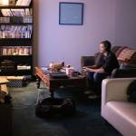 A Verne & Wells member uses the club&rsquo;s screening room to play a video game. CATHERINE KRUMMEY / Kirkland Reporter