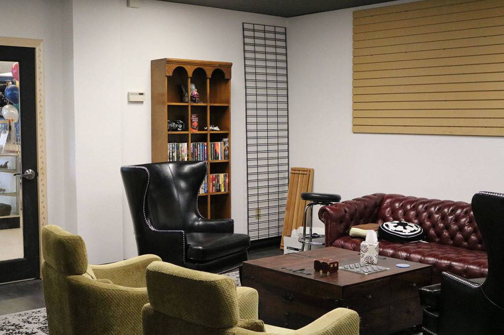 A seating area at Verne & Wells directly connects to neighboring Games & Gizmos (through the door on the left). CATHERINE KRUMMEY / Kirkland Reporter
