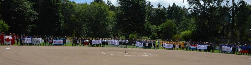 All 10 teams line up around the diamond.
