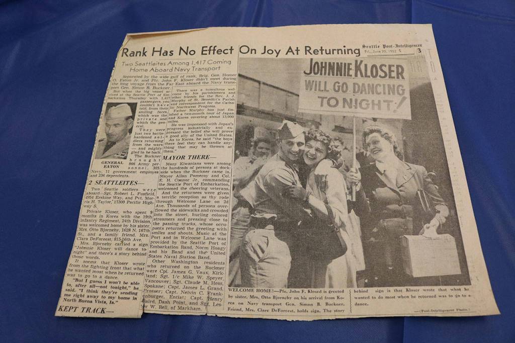 A newspaper clipping of Ann Bjorneby reuniting with her brother John Kloser upon his return from serving in the Korean War. Samantha Pak, Kirkland Reporter