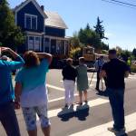 Neighbors watch the house be moved to a temporary location in August 2016. Photo courtesy of the city of Kirkland