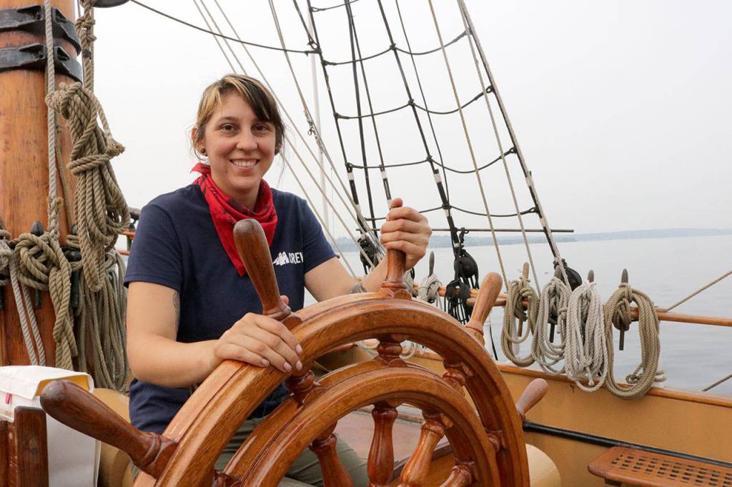 Jennica Martinez, crew member on the Hawaiian Chieftain, at the helm Sept. 7. Megan Campbell/Kirkland Reporter