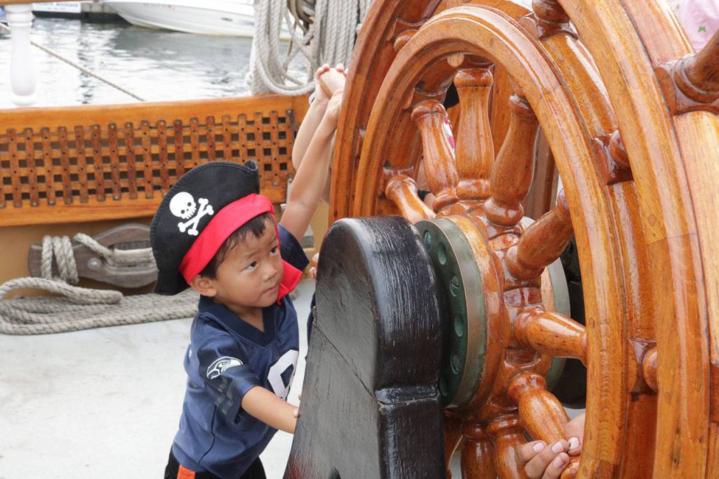 Marcus Chun, 3, steers the Hawaiian Chieftain Sept. 7. Megan Campbell/Kirkland Reporter