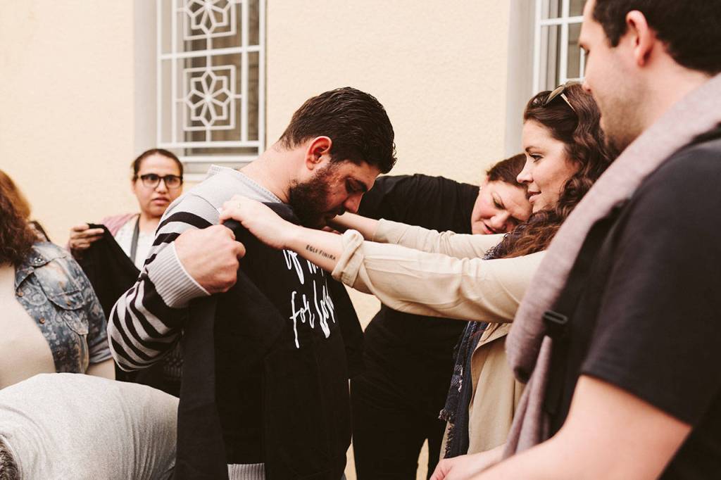 If Not for Love distributes sweaters and t-shirts to refugees around the world. Courtesy of If Not for Love